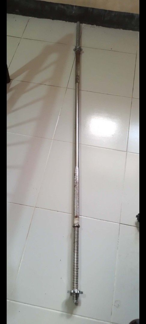 Standard Barbell Bar for Weightlifting and Strength Training (Category: Weights & Dumbbells) located in Manila. Submitted by mysticbird.56afd7 (Listing ID 1448545814, Image 1). Description: - Standard barbell bar - Ideal for home workouts and gym sessions - Features good grip knurling - Shows minor scuff marks from regular use - Ready for your next lift - Feel free to ask any questions!.