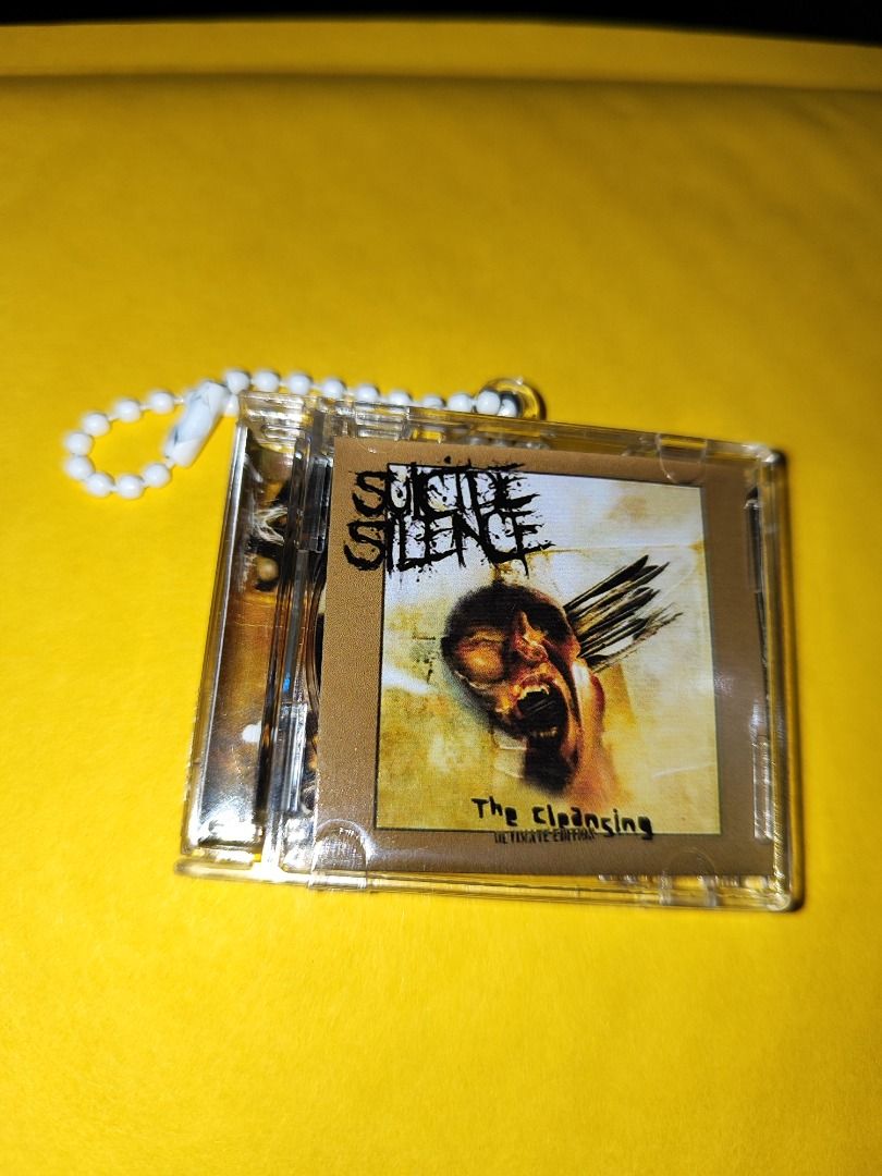 Suicide Silence The Cleansing CD Keychain (Category: CDs & DVDs) located in Caloocan City. Submitted by nfcminicdkeychainsbytin (Listing ID 1448534941, Image 1). Description: - Suicide Silence 'The Cleansing' CD keychain - Ultimate Edition - Ideal for band fans - Small and portable design - Features a beaded chain - Great for attaching to bags or keys.