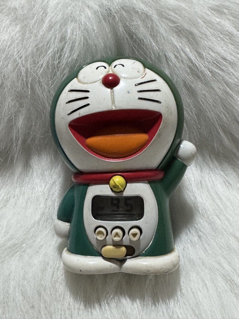 T1 SEIKO Doraemon Talking Alarm Clock (Category: Clocks) located in Angeles City. Submitted by zyeplustradings (Listing ID 1448498006, Image 1). Description: SEIKO Doraemon Talking Alarm Clock Doraemon Talking alarm clock No back cover Functionality unconfirmed, this is a junk item and is for display purposes only. As this is a retro item, it has scratches, stains, fading, yellowing, and other signs of deterioration..