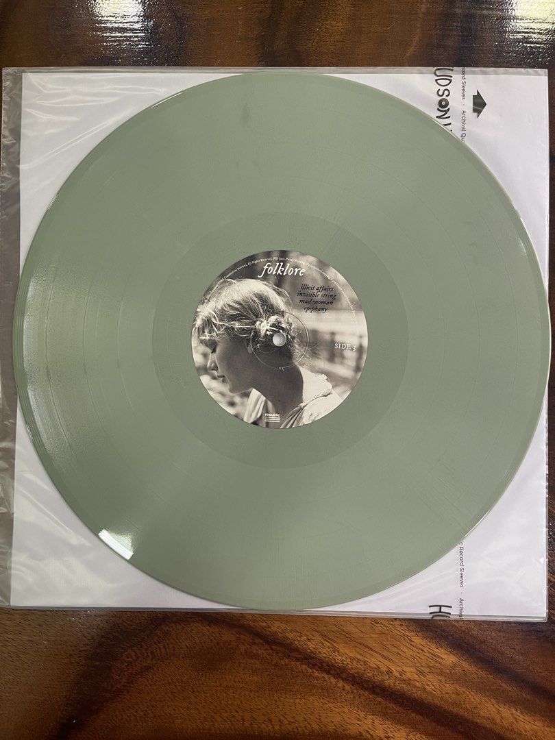 Taylor Swift - Folklore Green “Stollen Lullabies” Vinyl Variant (Category: Vinyls) located in Quezon City. Submitted by lunarbeenie (Listing ID 1448605936, Image 3). Description: .