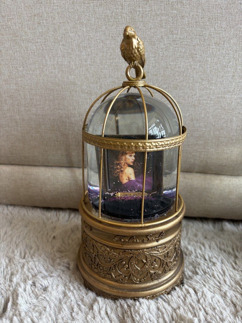 Taylor Swift Speak Now Birdcage Snow Globe (Category: Western Merchandise) located in Pasig City. Submitted by jamcy31 (Listing ID 1448510783, Image 1). Description: No box, mint condition Plays “Enchanted” Taylor’s Version.