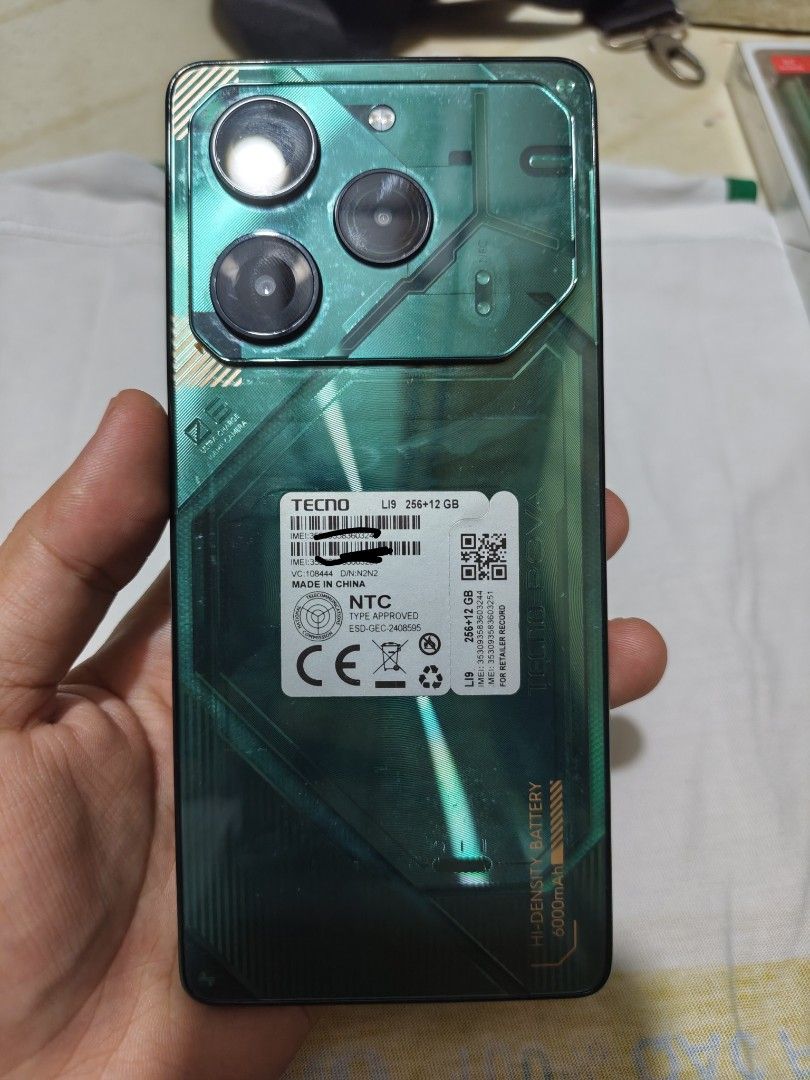TECNO POVA 6 PRO 5G 256GB (Category: Android Others) located in Manila. Submitted by thearrow0246266 (Listing ID 1448548896, Image 1). Description: For Sale : TECNO POVA 6 PRO 5G 256GB 6,000 Fixed Price. 2 years old na po ung unit 1st owner po ako Package: Box Original Charger Unit Phone Case No Issues. Test to sawa. Will Factory Reset po upon meet up DOP: March 13, 2024 ill send the reciept copy from Tiktok shop . RFS : Need Funds Loc : Manila A