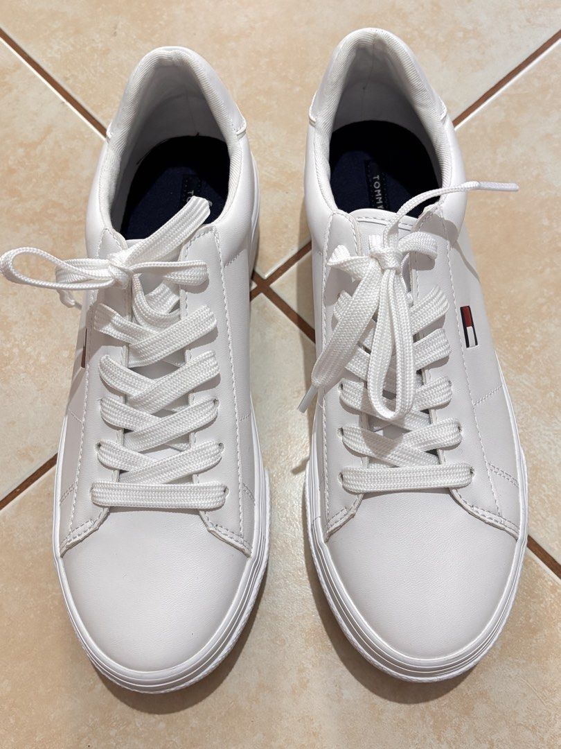 Tommy Hilfiger White Bueri Sneakers (Category: Sneakers) located in Manila. Submitted by 12essentials (Listing ID 1448546940, Image 3). Description: - Bought in WINNERS CANADA 🇨🇦 - Brand New but no hang tag - Model numer: TWBUERI-WHI01-140 - White Tommy Hilfiger platform sneakers - Classic lace-up style - Features Tommy Hilfiger logo on the side - Embossed full logo on the platform sole - Clean and classic look - Ideal for casual wear.