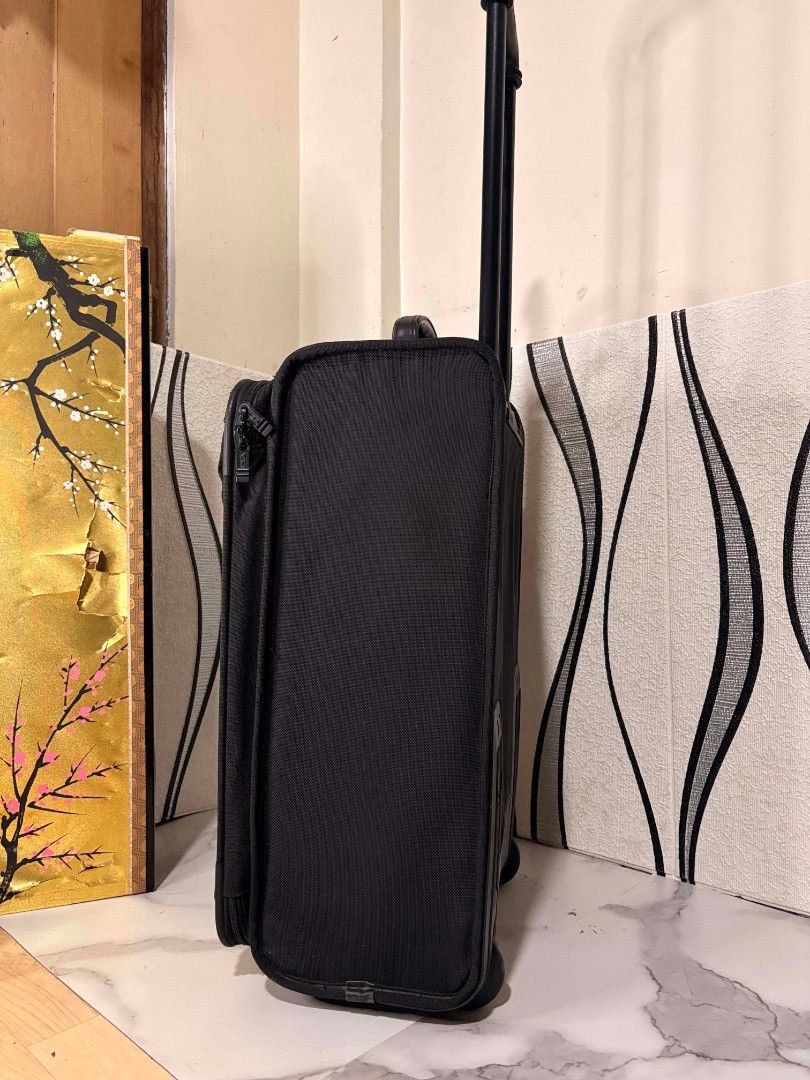 Tumi Alpha 2 Small Luggage Imported from Japan (Category: Luggage) located in Manila. Submitted by jzjapansurplus (Listing ID 1448660541, Image 2). Description: - Black Tumi Alpha 2 small luggage - Imported from Japan - Dimensions: 23x14x9 inches - Durable and reliable for travel - Retractable handle and wheels for easy transport - Ample space for essentials - Ideal for short trips or as a carry-o 🇯🇵IMPORTED FROM JAPAN TUMI ALPHA 2 SMALL LUGGAG