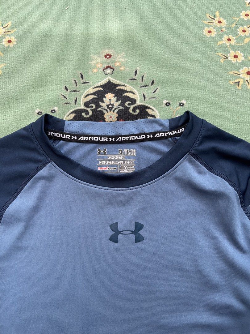 Underarmour Compression Tee (Category: Activewear) located in Angeles City. Submitted by outboxph (Listing ID 1448638026, Image 3). Description: CODE: Pi34 Authentic/Legit with tag and wash tag Size: XL on tag (best fit to medium) Dimensions: 26L x 17W Sleeve Length: 7L Condition: 9/10 .