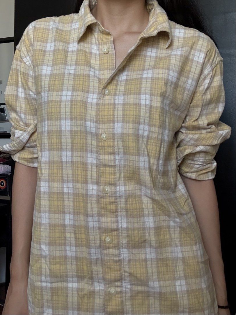 UNIQLO Yellow Plaid Button-Down Shirt (Category: Longsleeves) located in Quezon City. Submitted by honeys_resells (Listing ID 1448562410, Image 1). Description: ✨ Excellent condition – no tears, stains, or major damages ✨ Authentic UNIQLO button-down in a soft yellow and cream plaid pattern ✨ Lightweight, breathable fabric that’s comfortable for all-day wear ✨ Relaxed fit that’s easy to style as a top or layering piece This versatile plaid shirt 