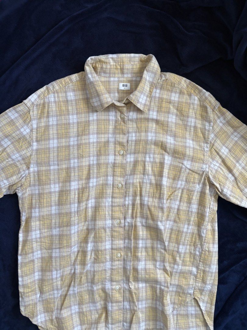 UNIQLO Yellow Plaid Button-Down Shirt (Category: Longsleeves) located in Quezon City. Submitted by honeys_resells (Listing ID 1448562410, Image 2). Description: ✨ Excellent condition – no tears, stains, or major damages ✨ Authentic UNIQLO button-down in a soft yellow and cream plaid pattern ✨ Lightweight, breathable fabric that’s comfortable for all-day wear ✨ Relaxed fit that’s easy to style as a top or layering piece This versatile plaid shirt 