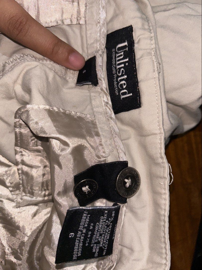 Unlisted Jorts Beige Cargo Shorts (Category: Shorts) located in Cebu City. Submitted by _____08_____ (Listing ID 1448619455, Image 2). Description: - Waist: 32 - Brand: Unlisted - Color: Beige - Style: Cargo Shorts - Closure: Button and zip fly - Pockets: Two front, two back - Features: Adjustable tab at the hem - Ideal for: Casual wear.