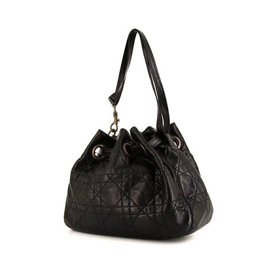 Vintage Dior Cannage Drawstring Bag in Black (Category: Luxury Bags & Wallets) located in Pasig City. Submitted by alexstuff (Listing ID 1448611882, Image 2). Description: - Vintage Christian Dior Cannage Drawstring Bag in Black - Bought from a vintage store in japan in 2018 - Guaranteed authentic - price is negotiable - rfs: Decluttering .