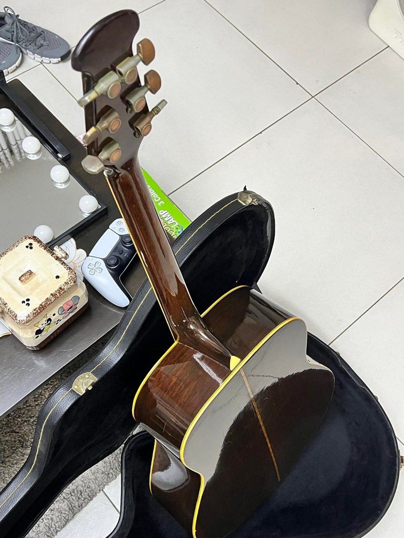 Vintage Japanese All-Solid Dreadnought Guitar with Hardcase (Category: Musical Instruments) located in Calamba. Submitted by joshuacasupang (Listing ID 1448622414, Image 3). Description: Vintage Japanese All-Solid Dreadnought Guitar with Hardcase Price: ₱15,000 Body: Dreadnought Shape Build: Full Solid Wood Construction (All-Solid) Top: Solid Aged Spruce Back/Sides: Solid Rosewood / Mahogany Details: Condition: Beautifully aged wood, deep resonan