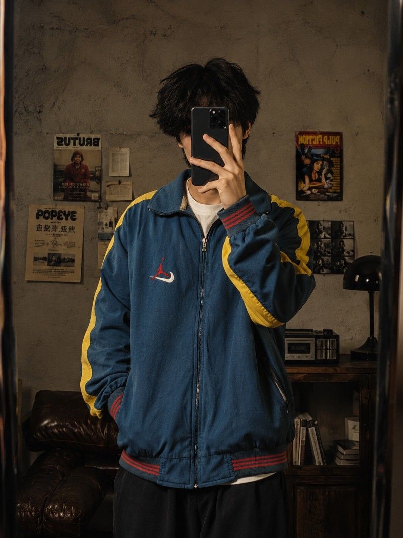 Vintage Nike Premier Track Jacket XXL (Category: Coats, Jackets and Outerwear) located in Manila. Submitted by carlitorep57860 (Listing ID 1448674997, Image 1). Description: - Vintage Nike Premier track jacket - Color: Teal blue with yellow and red accents - Features iconic Jumpman and Nike swoosh logos - Includes NBA patches on sleeves - Zipper closure - Ribbed cuffs and hem - Size: XXL.
