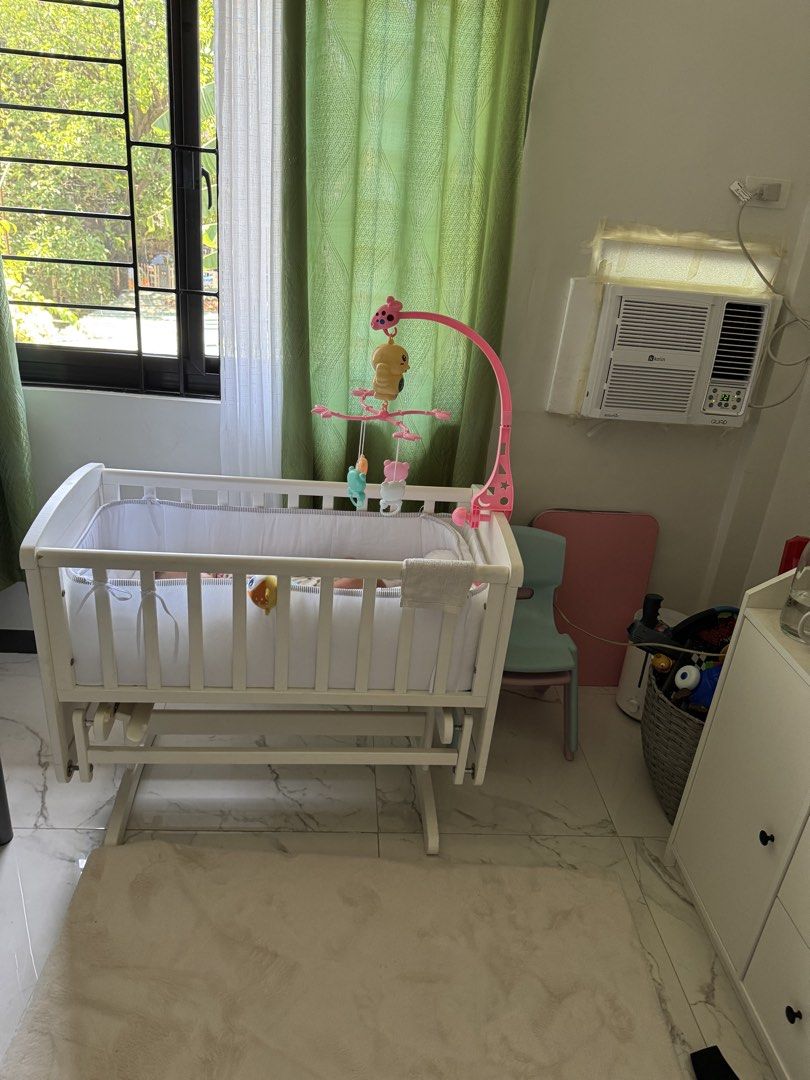 White Baby Crib with Mobile and Glider Base (Category: Cots & Cribs) located in Manila. Submitted by deddelyn (Listing ID 1448496588, Image 3). Description: Bought this on Mother Care Store Shangrila ( solid wood) almost 20k original price, selling now 6900 only, crib only, yung side bedding 3k sa sm mega mall na bili kahit 1500 na lang then yung foam free na. Head pillow and 2 long pillows 500 na lang nabili ko don ng 2k sa megamall. You’ll sa p