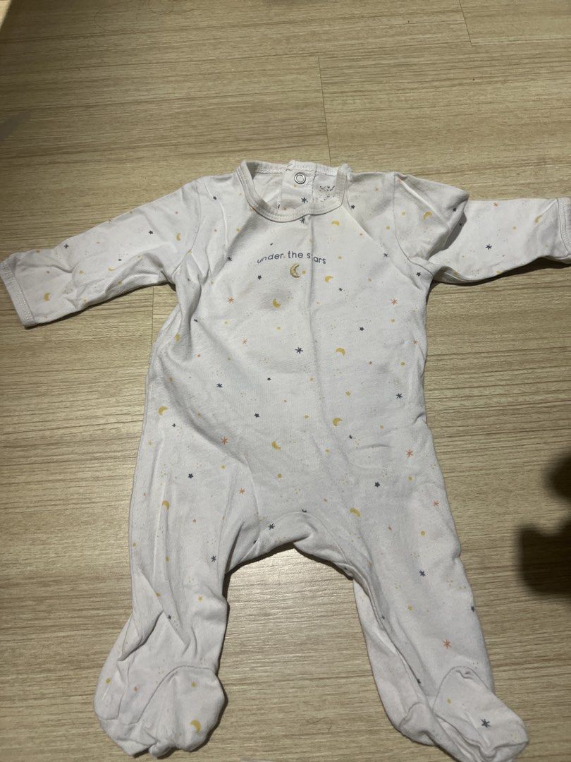 White Baby Sleepsuit with Moon and Star Print (Category: Babies & Kids Fashion) located in Kuala Lumpur. Submitted by nuramiyaa (Listing ID 1448618467, Image 1). Description: - White long-sleeved baby sleepsuit - Adorable all-over moon and star print - Easy front popper fastenings - Footed design for warm toes - Made from soft, comfortable fabric - Perfect for sleep or lounging.