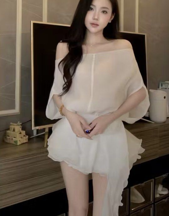 White off-shoulder top and ruffled skirt set (Category: Sets or Coordinates) located in Manila. Submitted by lalayie (Listing ID 1442328262, Image 1). Description: Used only once - White off-shoulder top with flowy design - Layered, asymmetrical hem on the skirt.