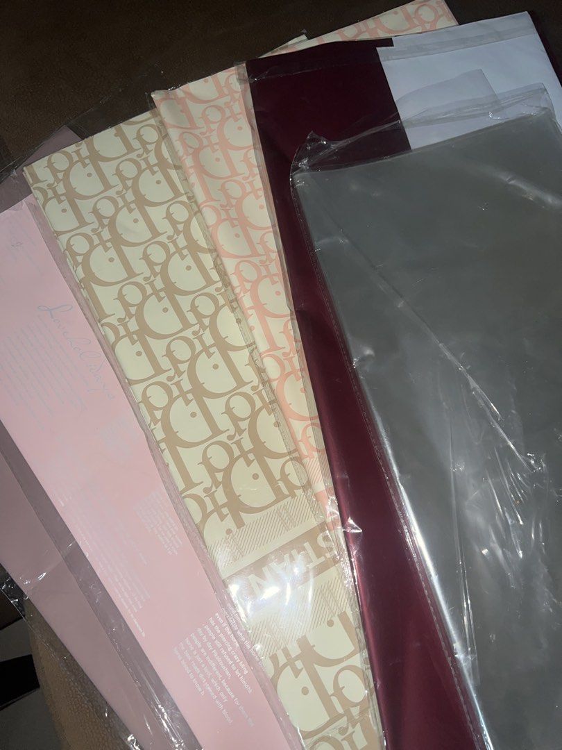 Wrapping Paper Sheets - Pink & Beige Monogram (Category: Craft Supplies & Tools) located in Manila. Submitted by jmplovesfries (Listing ID 1448533423, Image 1). Description: - Used Floral Wrapping Paper - Authentic Dior monogram wrapping paper - Available in classic pink and beige colors - Ideal for gift wrapping or creative craft projects - Multiple sheets per purchase - Feel free to ask any questions!.