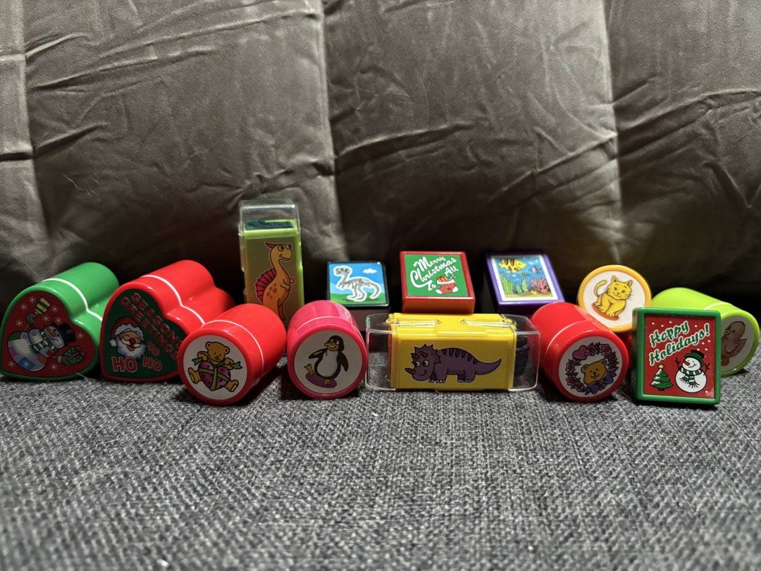 13 pcs Assorted Fun Stamps set - Animals, Dinosaurs, Christmas (Category: Craft Supplies & Tools) located in Naga. Submitted by myroomarchive (Listing ID 1453069060, Image 1). Description: - Collection of fun stamps - Includes cute animals (bears, cats, penguins, ducks) - Features dinosaurs - Festive Christmas designs (Santa, snowmen, holiday greetings) - Great for kids' crafts, party favors, or scrapbooking - Variety of shapes (heart-shaped, rec