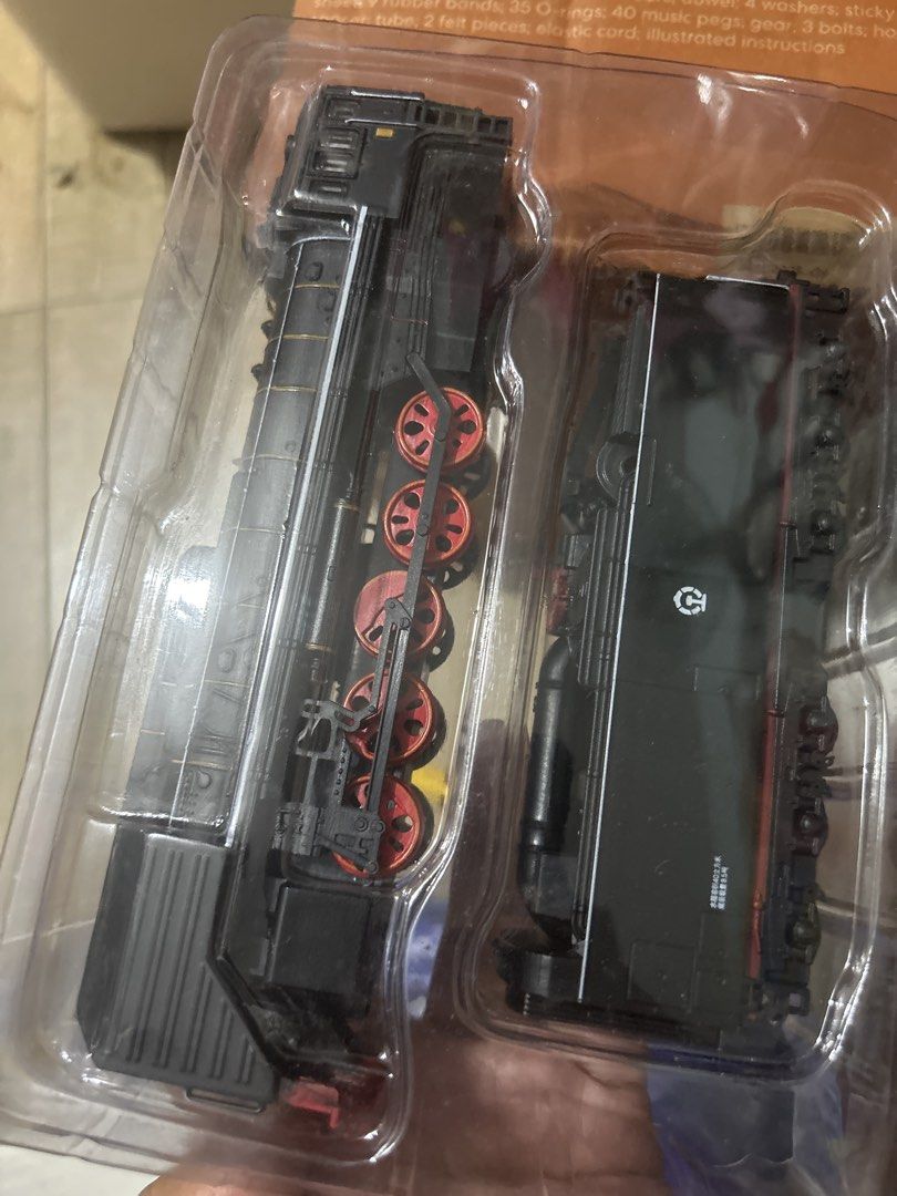 1:87 Scale Metal Model Train Collection (Category: Vehicle & Diecast Models) located in Paranaque City. Submitted by zac.sei (Listing ID 1453212984, Image 3). Description: - 1:87 scale metal model train set - Brand new, in original packaging - Highly detailed design - Unique red wheels - Box features a classic steam train illustration - Perfect for collectors and train enthusiasts - Excellent for display purposes - batteries not included.