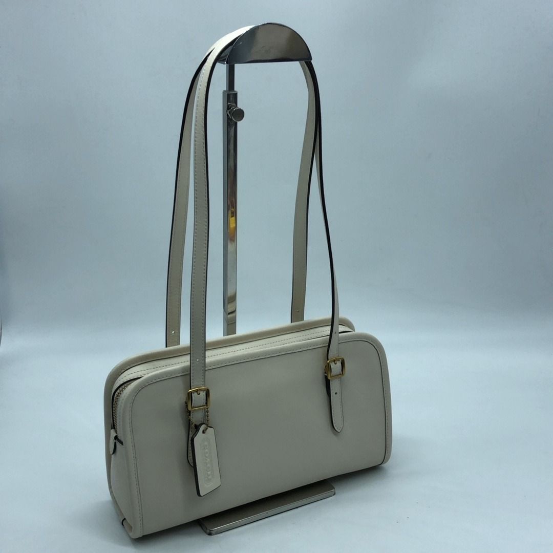 267007454 COACH BAG LEATHER SWING CM565 (Category: Luxury Bags & Wallets) located in Taguig. Submitted by ecoring.ph (Listing ID 1453066061, Image 1). Description: ◆CONDITION: B+ ◆DESCRIPTIONS: (Other defects/info:) ◆CONDITION: B+ ◆DESCRIPTIONS: (Other defects/info:) OUTER: The body of the bag has minimal scratches, scuffs, press marks, and wrinkles, and shows signs of use. The tabs and top handle of the bag also have minimal scratches , wrinkles