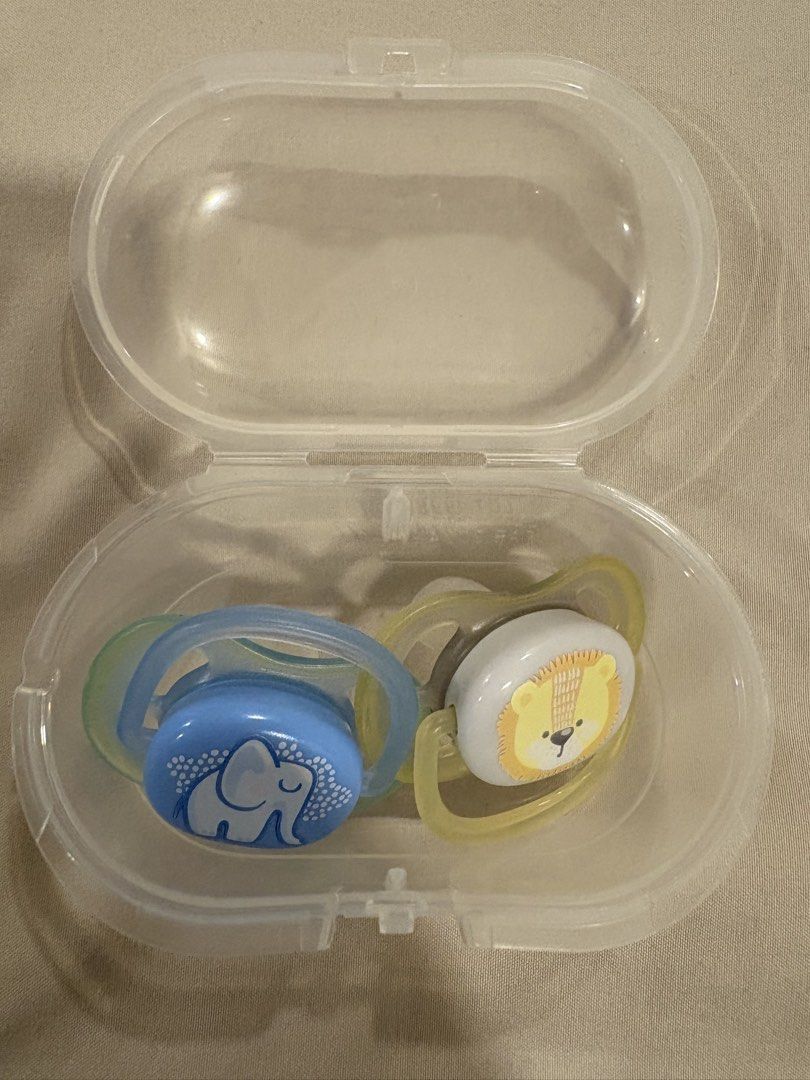 2pcs Philips Avent Ultra Air Orthodontic Pacifiers with Case (Category: Soothers & Pacifiers) located in Pasig City. Submitted by fashionforward16 (Listing ID 1453070250, Image 2). Description: - Set of 2 Philips Avent pacifiers -With sterilizer/carry case -Ultra Air design for maximum airflow to baby’s sensitive skin - Features cute elephant and lion design - Includes a clear plastic carrying case for hygiene on the go - Orthodontic nipple shape