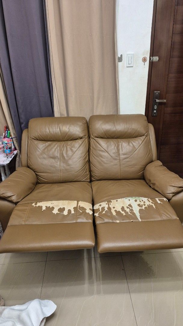 2-Seater Manual Recliner (Category: Sofas) located in Bacoor. Submitted by jaizalouriz (Listing ID 1453124445, Image 2). Description: selling our 2 seater manual recliner sofa. RFS: Moving out needs upholstery as pictured, but other than that, working properly. Negotiable for sure buyers. pick up only - this is heavy. loc: Bacoor .
