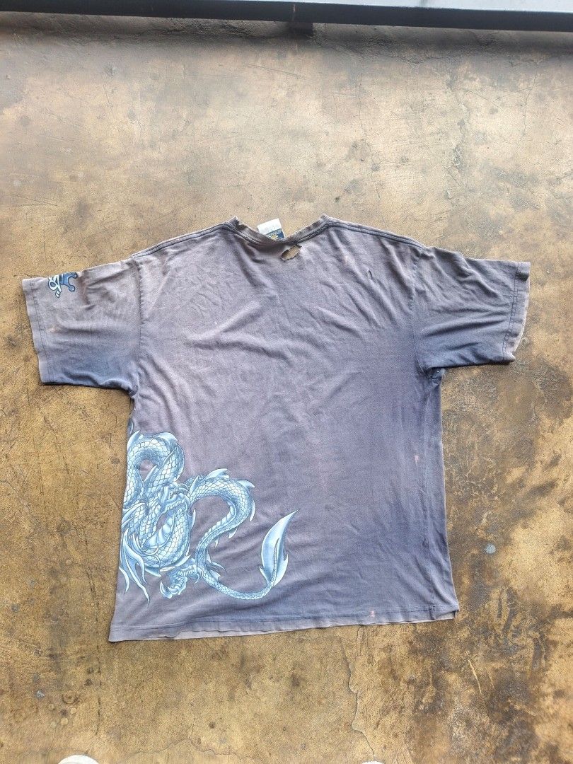 90'S distressed Jnco Jeans Dragon Wrap around Tee (Category: Tshirts & Polo Shirts ) located in Manila. Submitted by stenkss (Listing ID 1453215112, Image 2). Description: Good size! Dm for more dets nego.