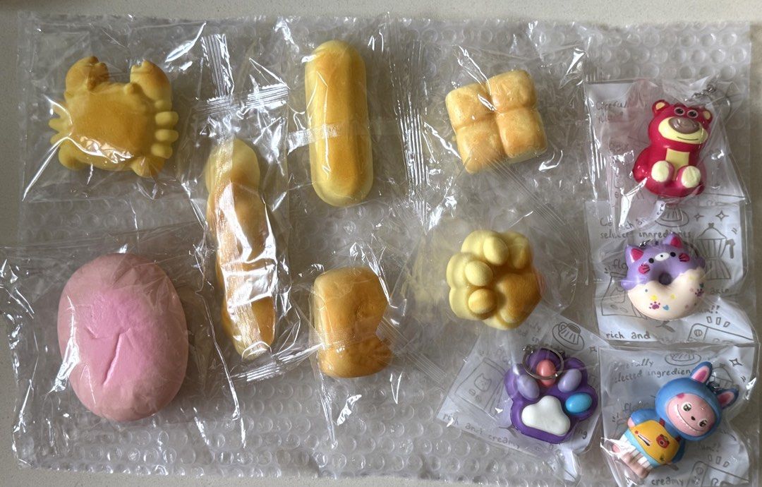 assorted squishy (Category: Kids Toys) located in Singapore. Submitted by iihsanoak (Listing ID 1453119965, Image 1). Description: yellow ones - $1.5 keychains - $1.5 pink one - $2.5.