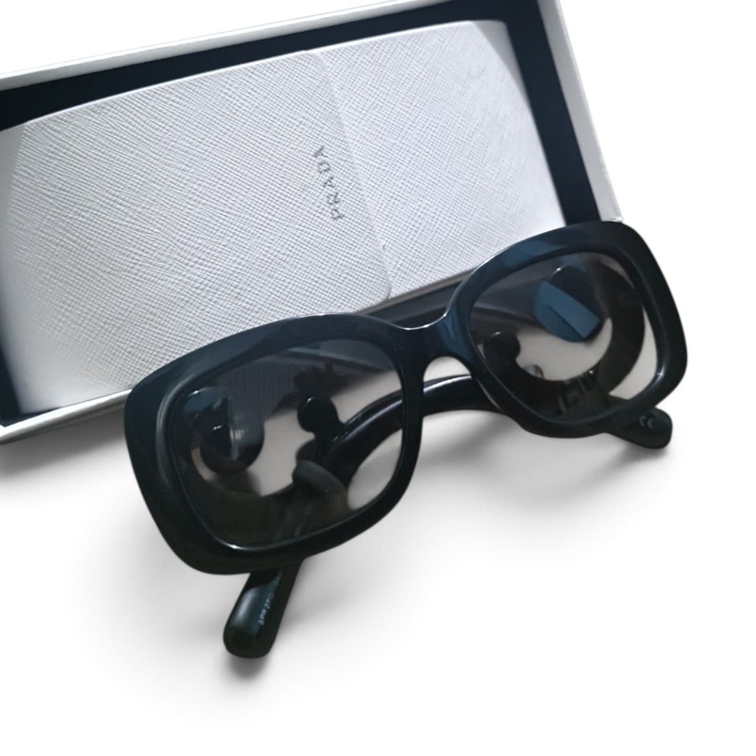 Auth Prada Baroque Sunglasses (Category: Luxury Accessories) located in Manila. Submitted by eternelley (Listing ID 1453058503, Image 1). Description: RFS: Too many sunglasses. LP: 4,000 PHP - Comes with original box and case Issues: -Sa sunglasses, may scratches, and lightly loose sa may temple area. -'Yong box is may slight punit na. -The case has a minimal stain. MOP: GCash or Maribank MOD: JNT.