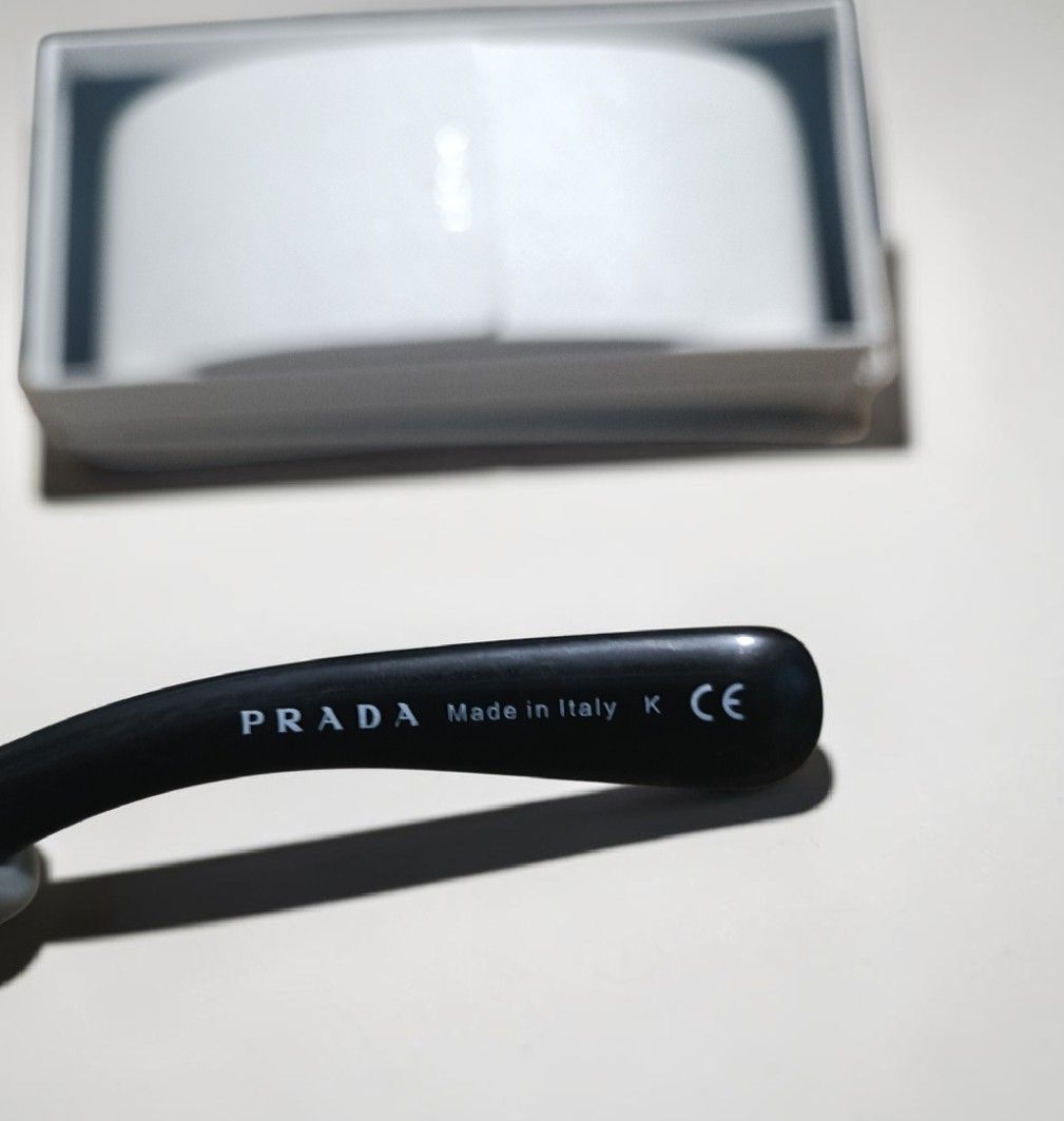 Auth Prada Baroque Sunglasses (Category: Luxury Accessories) located in Manila. Submitted by eternelley (Listing ID 1453058503, Image 3). Description: RFS: Too many sunglasses. LP: 4,000 PHP - Comes with original box and case Issues: -Sa sunglasses, may scratches, and lightly loose sa may temple area. -'Yong box is may slight punit na. -The case has a minimal stain. MOP: GCash or Maribank MOD: JNT.