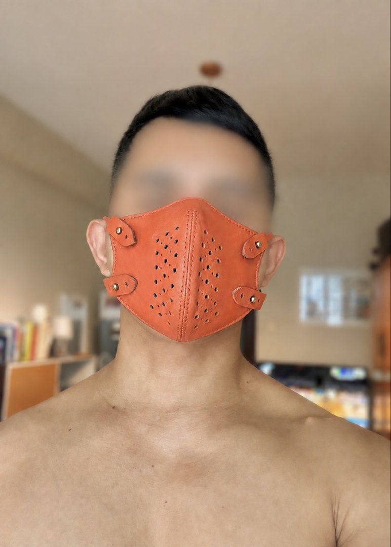 Authentic Fino Leatherware Full Leather Face Mask (Category: Face Masks & Face Shields) located in Mandaluyong City. Submitted by material_boi (Listing ID 1453103792, Image 3). Description: Store bought for almost ₱3K. Super nice, in beautiful orange color. Hindi siya uncomfortable to wear pero it has weight kasi it’s pure leather. With adjustable straps. With detachable and washable filter. You can also insert naman your regular mask in there. J