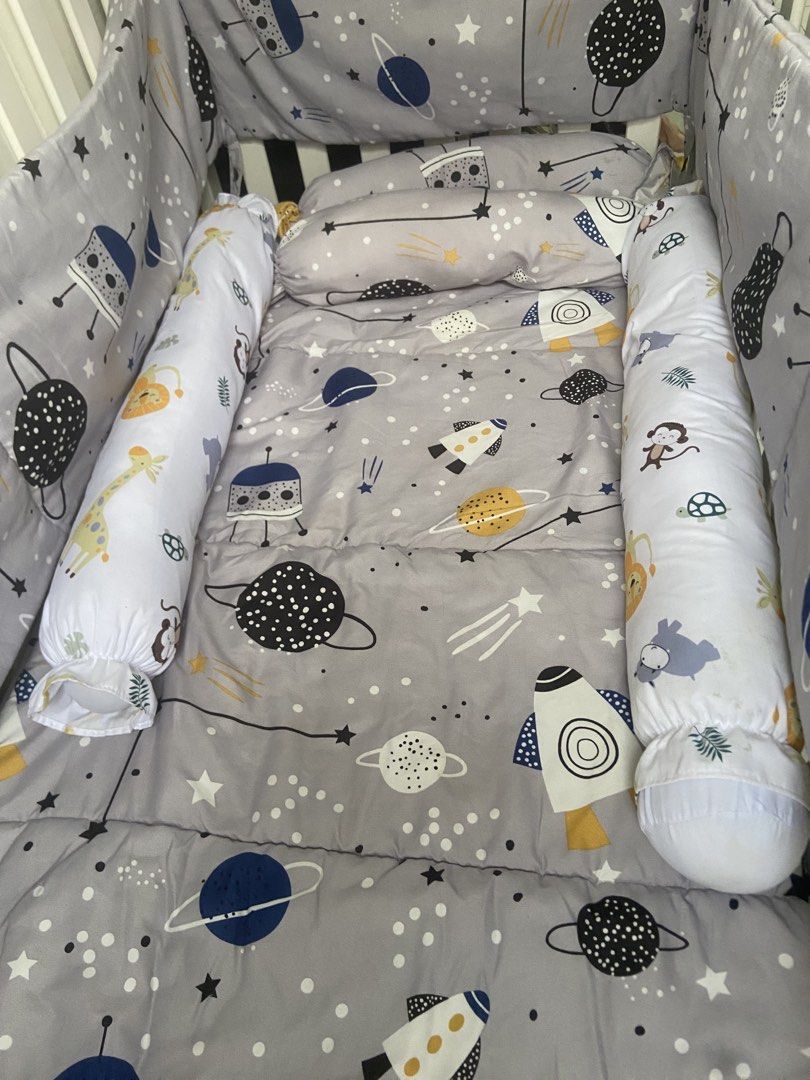Baby Crib Bedding Set - Space Rocket & Planet Theme (Category: Cots & Cribs) located in Manila. Submitted by arysgrc79897 (Listing ID 1453184135, Image 1). Description: With pillows and foam already Adjustable crib.