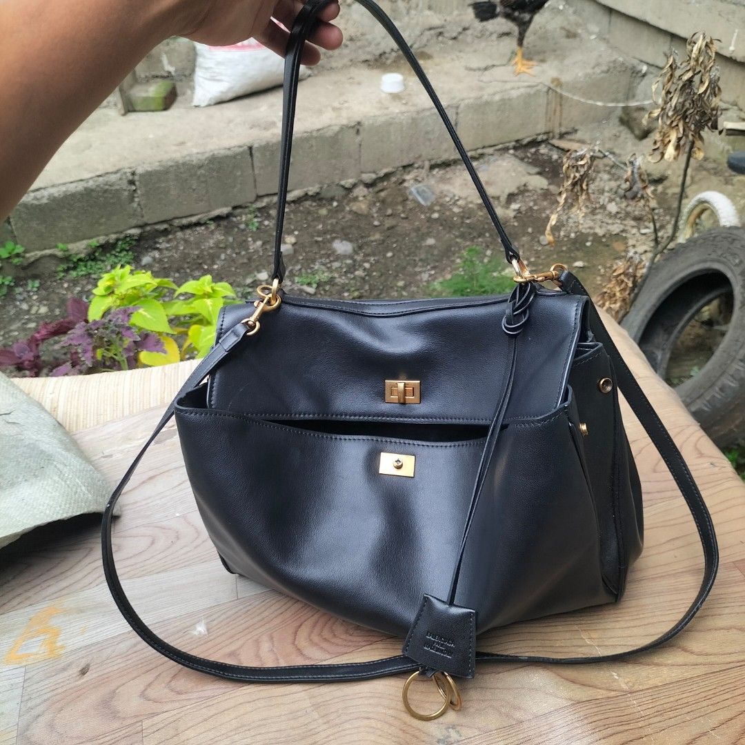 Balenciaga Rodeo Leather Bag (Category: Tote Bags) located in Aloran. Submitted by thrift_hunter73 (Listing ID 1452785121, Image 1). Description: All Details posted. Authenticity is not Guaranteed Thrifted Issue: Missing Lock only.