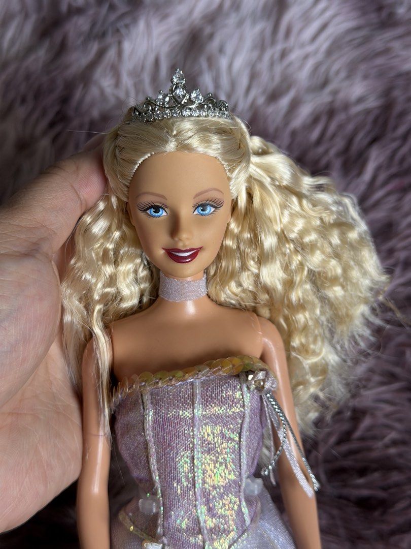 Barbie ( w/ Annika Dress) (Category: Kids Toys) located in Pasay City. Submitted by anglrsee (Listing ID 1453069424, Image 3). Description: FOR SALE: Php 1,500 if set - Annika Dress (1,200 php) - Doll (400 php) can bend knees - Tiara (200 php) bought in 🍊 - Doll Stand (50 php).