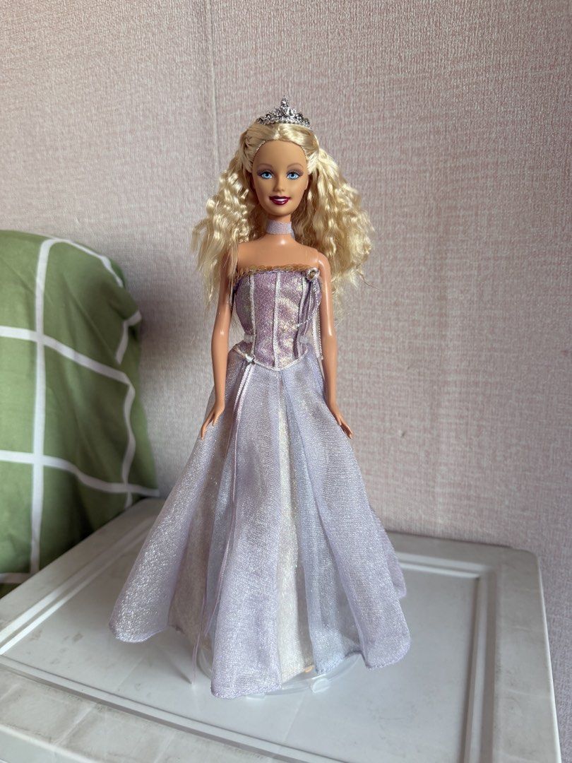 Barbie ( w/ Annika Dress) (Category: Kids Toys) located in Pasay City. Submitted by anglrsee (Listing ID 1453069424, Image 2). Description: FOR SALE: Php 1,500 if set - Annika Dress (1,200 php) - Doll (400 php) can bend knees - Tiara (200 php) bought in 🍊 - Doll Stand (50 php).