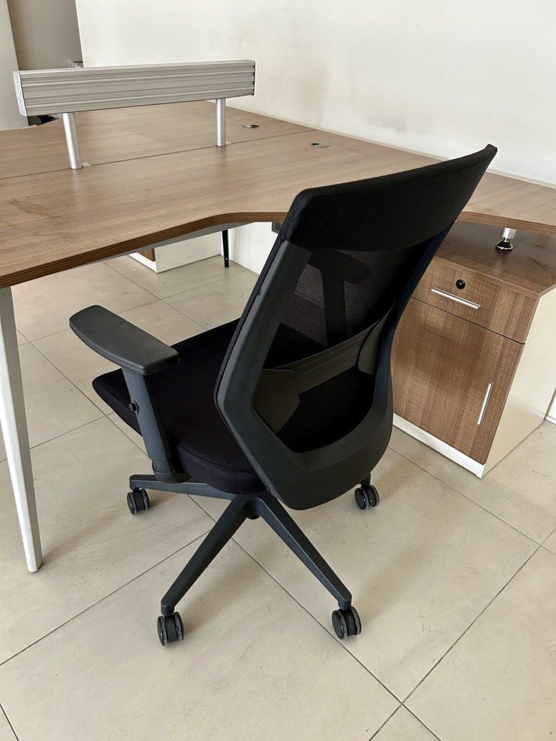 Ergo Black Mesh Back Office Chair with Armrests (Category: Chairs) located in Mandaluyong City. Submitted by jamieapple (Listing ID 1453117061, Image 3). Description: - Black mesh back office chair - Padded armrests for comfort - Comfortable seat cushion - Smooth-rolling wheels for easy mobility - Ideal for home office or workspace - Made in Taiwan.
