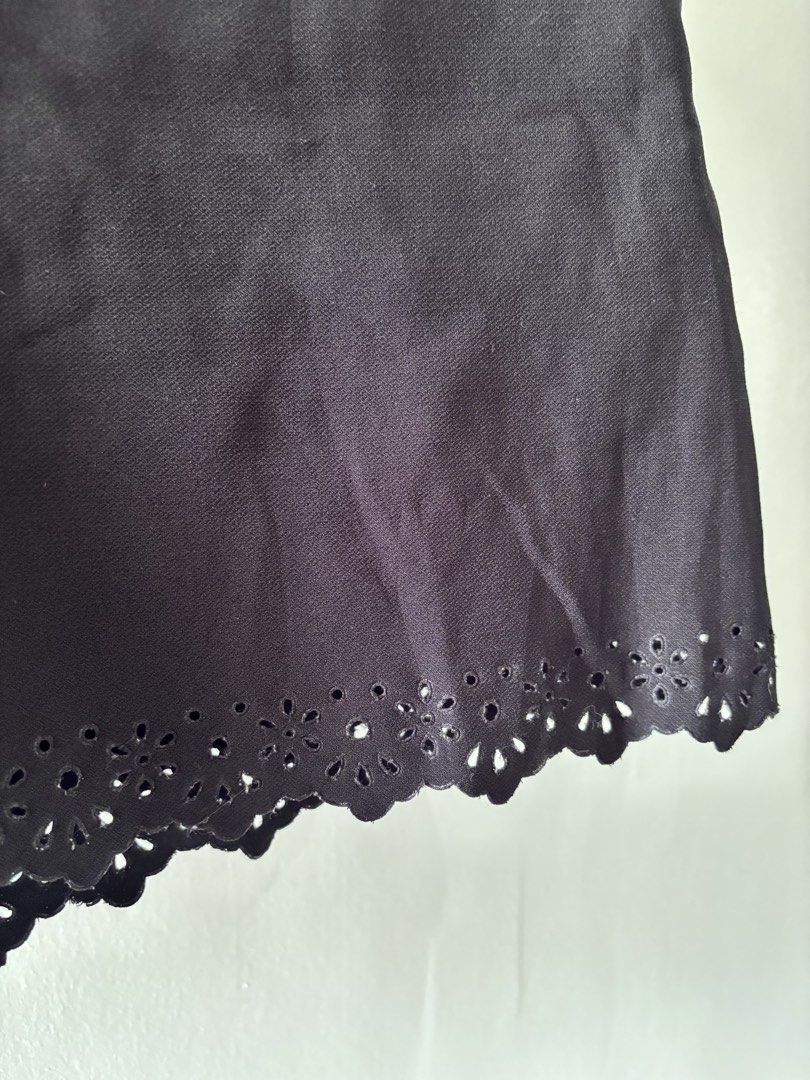 Black Shorts with Scalloped Eyelet Hem (Category: Shorts) located in Imus. Submitted by chermellee (Listing ID 1453158495, Image 3). Description: - Size: 29 - Stylish black shorts with a unique scalloped eyelet hem. - Convenient side zipper closure. - Functional front pockets - Versatile for casual outings or dressing up. - Comfortable and easy to pair Payment Methods: GCash MariBank Maya.