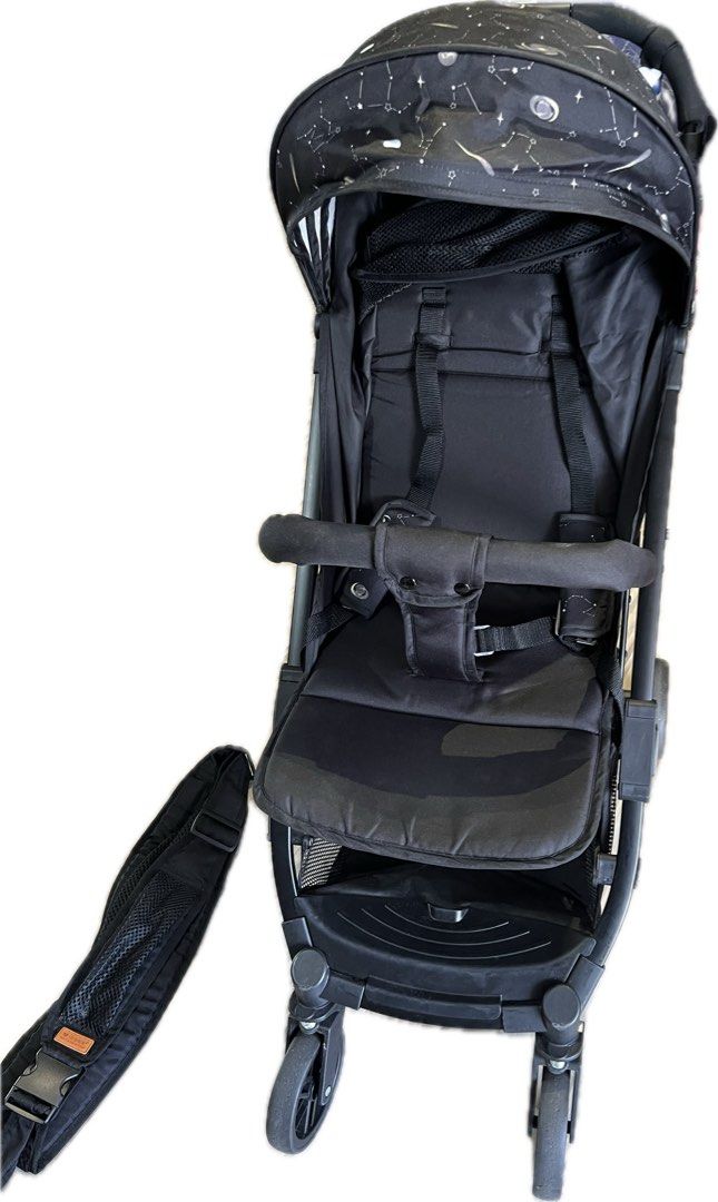 Black Stroller with Constellation Pattern (Category: Strollers) located in Singapore. Submitted by yunyhee (Listing ID 1453088021, Image 3). Description: - Lightweight stroller - Fun constellation print canopy - Secure 5-point harness - Convenient storage basket - Compact fold for storage - Ideal for travel and everyday use - Free baby carrier sling.