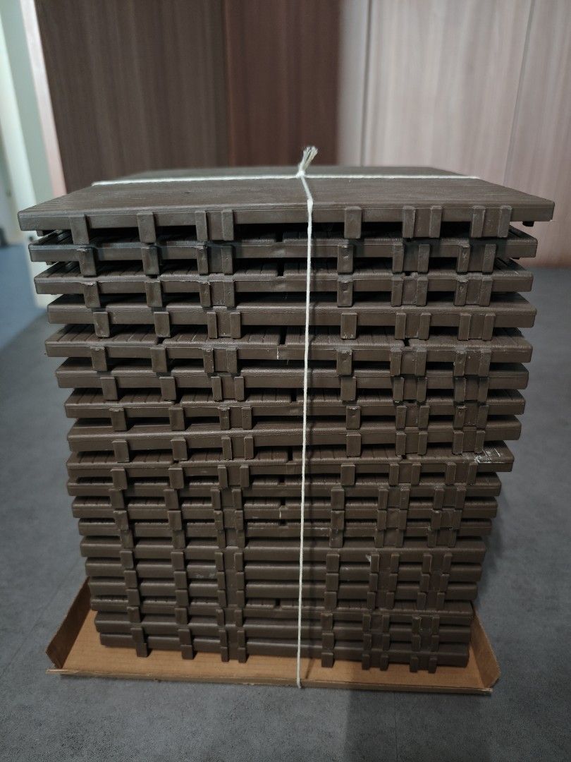 Brown Interlocking Decking (Category: Carpets & Mats) located in Singapore. Submitted by pimpstarz (Listing ID 1453147858, Image 1). Description: - Brown interlocking decking - Puzzle-like design for easy assembly - Ideal for gyms, playrooms, or workshops - Durable and easy to clean - Sold as a bundle - Suitable for BTO corridor - No Corner edge capping - 18 pieces total - 30x30 dimension.