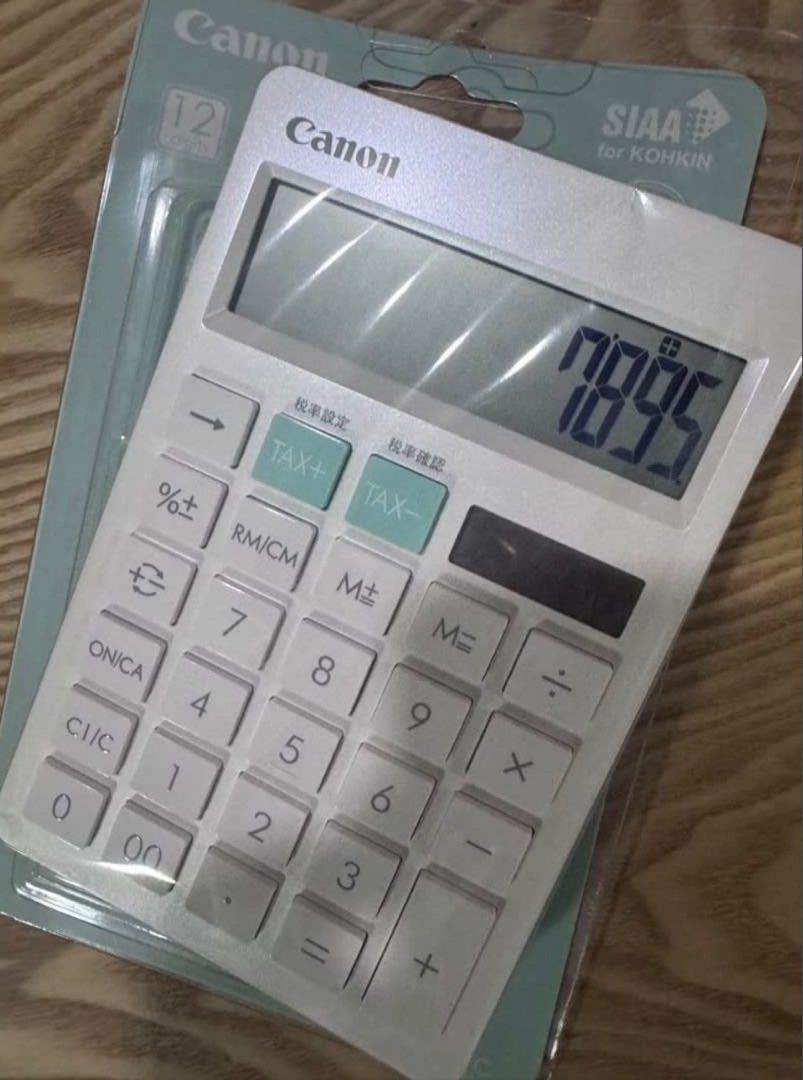 Canon SIA for KOHKIN Calculator (Category: Office & Business Technology) located in Manila. Submitted by decluterthings888 (Listing ID 1453082682, Image 1). Description: - Brand: Canon - Model: SIA for KOHKIN - Color: White - Condition: Brand new, in original packaging - Features: Tax calculation function - Ideal for: Everyday use, office tasks.