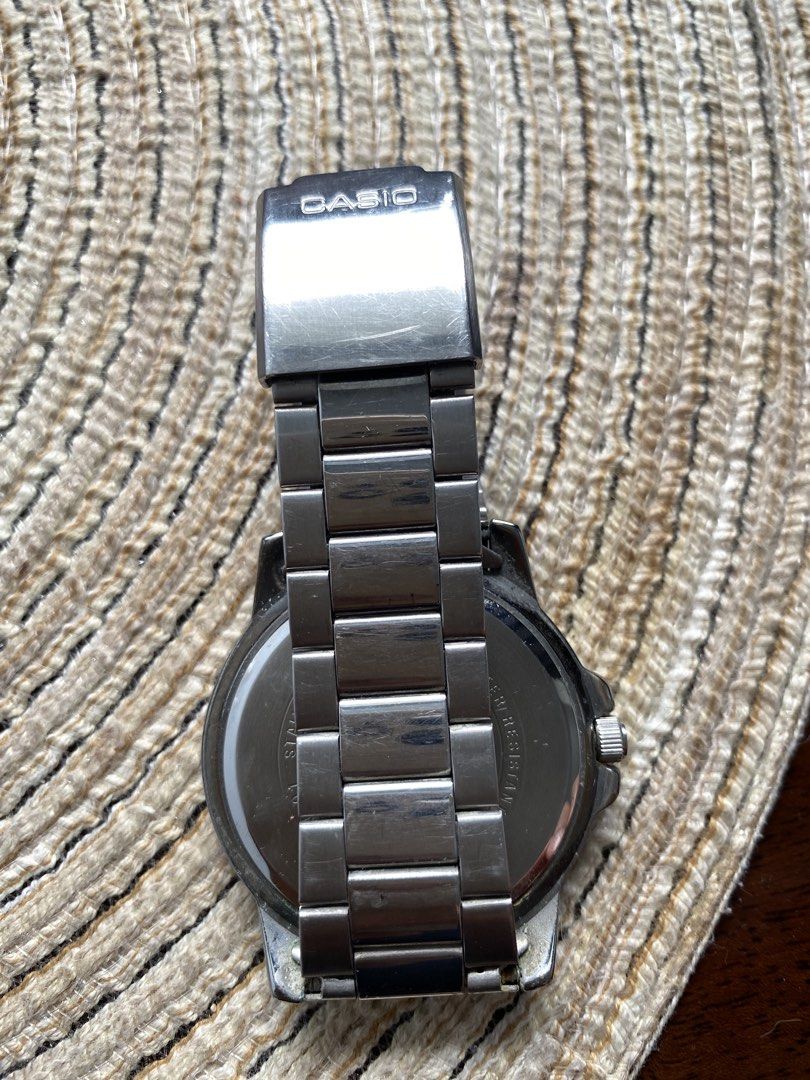 Casio Stainless Steel Watch (Category: Men's Watches) located in Quezon City. Submitted by stuffffffffit (Listing ID 1453080532, Image 2). Description: - Casio Stainless Steel Watch - Classic Black Dial with White Markers & Hands - Water Resistant (50 Meters) - Durable Metal Bracelet - Minor signs of wear on metal, as shown in photos.