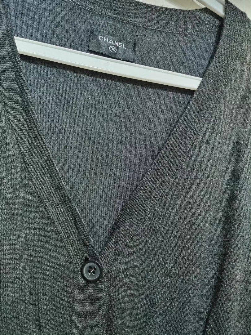 Chanel Grey Button-Up Cardigan (Category: Coats, Jackets and Outerwear) located in Quezon City. Submitted by chph3rd (Listing ID 1453062776, Image 3). Description: - Classic Chanel cardigan in versatile grey. - Long sleeves and V-neckline. - Button-up closure with two front pockets. - Cinched waist for a flattering silhouette. - Ideal for layering over tops or dresses..