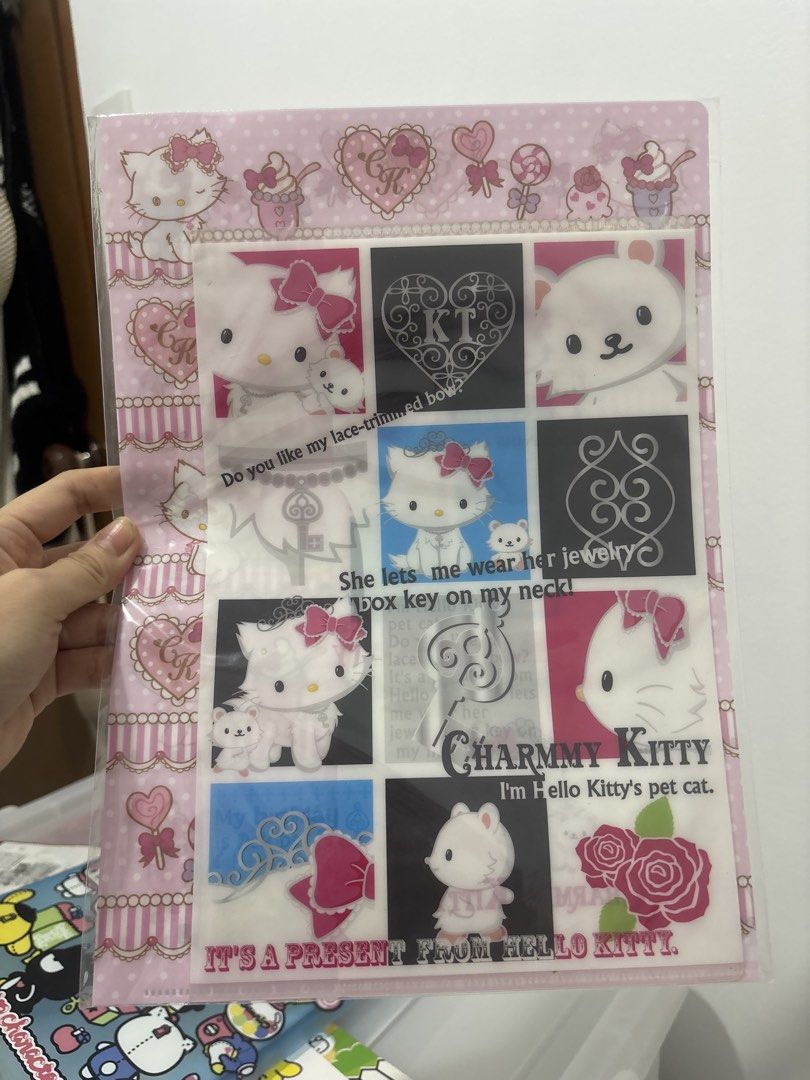 Charmmy kitty (sanrio) Folder (Category: Stationery & School Supplies) located in Cavite. Submitted by nekolla22 (Listing ID 1453221172, Image 2). Description: May small folder sa likod.