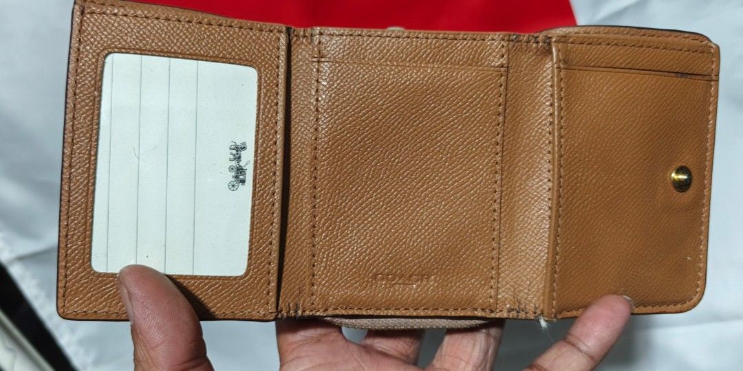 Coach small trifold wallet (Category: Luxury Bags & Wallets) located in Polomolok. Submitted by dkljapansurplus (Listing ID 1453180876, Image 3). Description: Coach folded wallet May kunting dumi, as is Made in cambodia from japan.