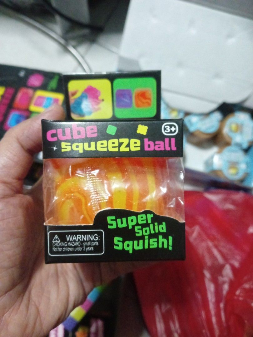 Cube Squeeze Ball - Super Solid Squish & Ultra Firm Squeeze (Category: Kids Toys) located in Pasig City. Submitted by benildarustia18 (Listing ID 1453219361, Image 1). Description: - Fun Cube Squeeze Balls available in vibrant orange and green. - Perfect for stress relief and fidgeting. - Orange ball: 'Super Solid Squish' for a satisfying squeeze. - Green ball: 'Ultra Firm Squeeze' for a more intense feel. - Suitable for both kids and adults. - I