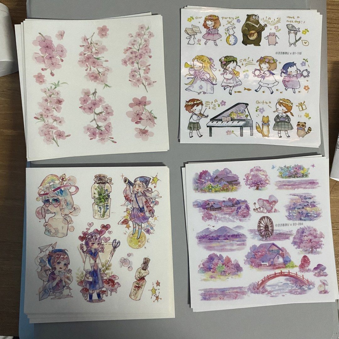 Cute Anime & Cherry Blossom Sticker Sheets (Category: Art & Prints) located in Manila. Submitted by alleyyagap62021 (Listing ID 1453062862, Image 1). Description: - 20 pesos each sheet - Sheet 1: Pink cherry blossoms. - Sheet 2: Cute anime characters with musical instruments and animals. - Sheet 3: Anime girls with unique hairstyles and accessories. - Sheet 4: Purple, dreamy landscape with houses and trees. - Ideal for journaling, scrapbooking, a