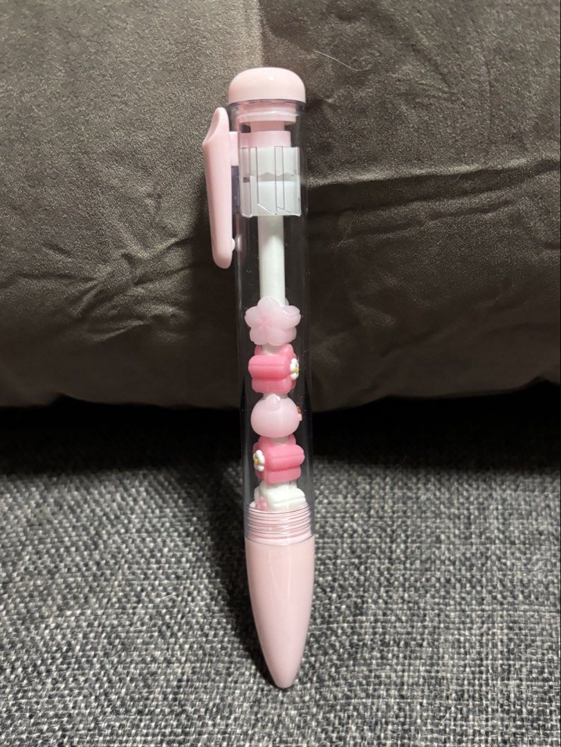 Cute Pink Gel Pen with Charms Inside (Category: Stationery & School Supplies) located in Naga. Submitted by myroomarchive (Listing ID 1453066010, Image 2). Description: - Adorable pink gel pen - Features cute flower and bunny charms inside the barrel - Writes smoothly in black ink - Ideal for journaling, note-taking, or as a fun accessory.