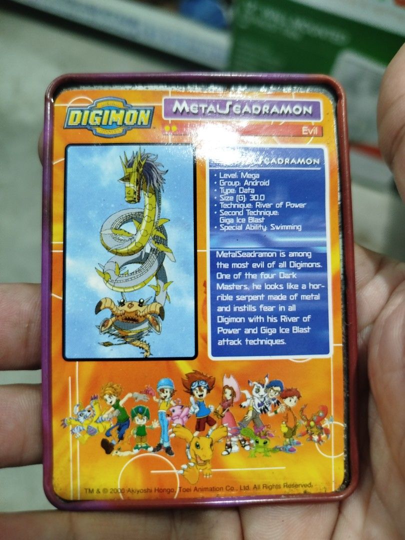 Digimon MetalSeadramon Evil metal Card (Category: Raw Singles) located in Subic. Submitted by regiedaniel01 (Listing ID 1453153542, Image 2). Description: - Digimon Card: MetalSeadramon - Level: Mega - Type: Evil - Group: Android - Power: 30.0 - Technique: River of Power - Special Ability: Swimming - Condition: Some wear around the edges - Ideal for: Digimon collectors.