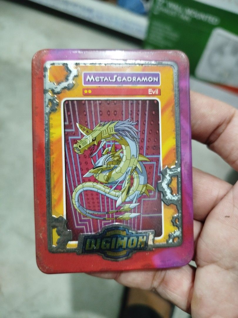 Digimon MetalSeadramon Evil metal Card (Category: Raw Singles) located in Subic. Submitted by regiedaniel01 (Listing ID 1453153542, Image 1). Description: - Digimon Card: MetalSeadramon - Level: Mega - Type: Evil - Group: Android - Power: 30.0 - Technique: River of Power - Special Ability: Swimming - Condition: Some wear around the edges - Ideal for: Digimon collectors.