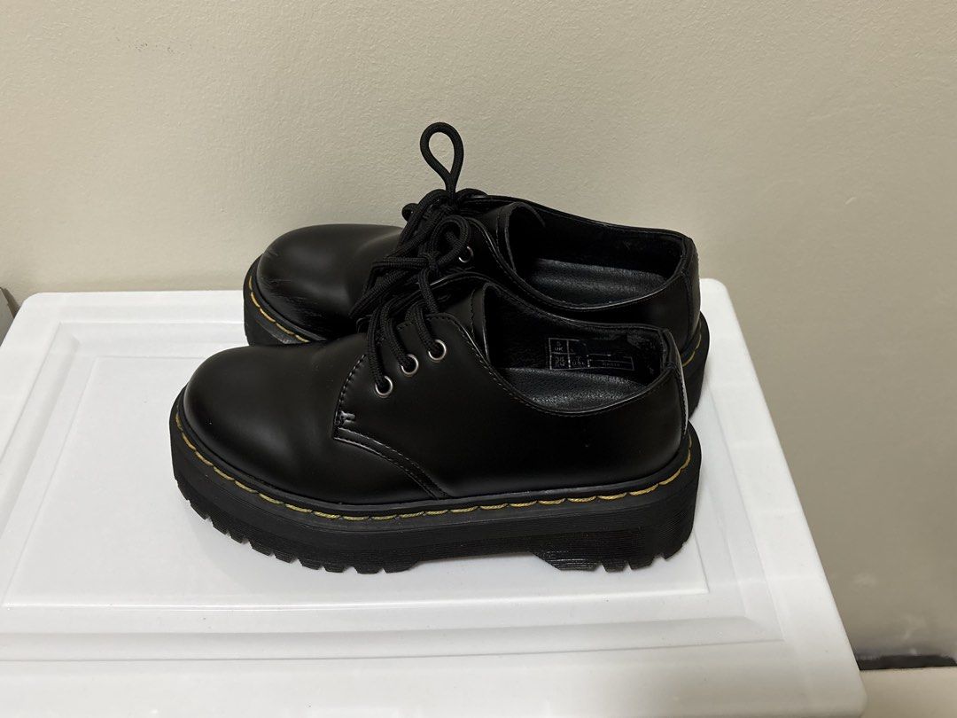 Dr. Martens Black Platform Lace-Up Shoes (Category: Boots) located in Manila. Submitted by cdc98 (Listing ID 1453218913, Image 2). Description: - Size: 37 (23.5cm) - Replica only - Lace-up style with signature yellow stitching - Chunky sole for added height - A bit heavy PLEASE READ ⚠️ • Strictly payment first before ship out • Modes of payment - Gcash, BDO, and BPI • Couriers: Gogo Express, Lalamove & Grab Express • No meet-ups • Seller location