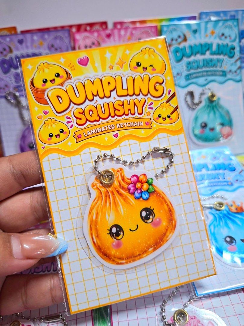 Dumpling Squishy Laminated Keychain (Category: Designer & Blind Box Toys) located in Antipolo. Submitted by satinnandprints (Listing ID 1453089817, Image 3). Description: - Adorable dumpling squishy keychains - Laminated for durability - Comes with a ball chain for easy attachment - Great for decorating bags, backpacks, or keys - Collect all the cute designs!.