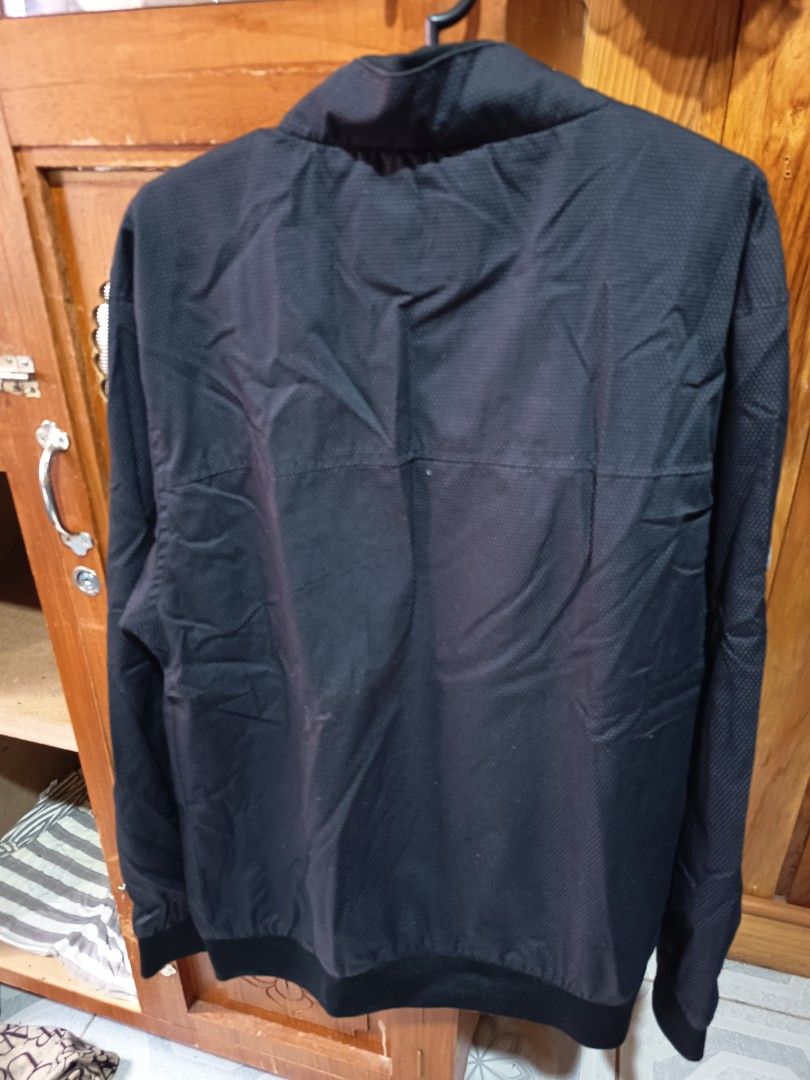 EDO Brooklyn NYC Original Label Jacket (Category: Coats, Jackets and Outerwear) located in La Trinidad. Submitted by blossomche98630 (Listing ID 1453116796, Image 2). Description: - Black jacket with subtle all-over dot pattern - Zip-up front with stand-up collar - Elasticated cuffs and hem for a snug fit - Contrasting purple-grey inner lining - Ideal for casual outfits or layering - Size: Medium (M).
